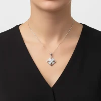 model wearing fancy square shaped rainbow moonstone silver pendant with cubic zirconia