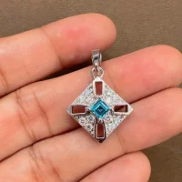 beautifully portraying the london blue topaz square shaped silver pendant on hand