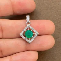 beautifully portraying green onyx and cubic zirconia together creating square shaped silver pendant