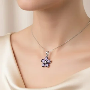 model wearing amethyst silver pendant with cubic zirconia