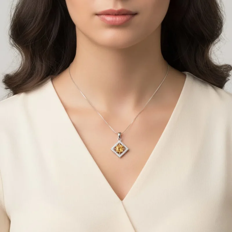 model wearing beautiful square shaped silver pendant with citrine and cubic zirconia