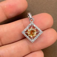 beautifully portraying citrine and cubic zirconia together creating square shaped silver pendant
