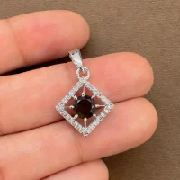 beautifully portraying smoky quartz and cubic zirconia together creating square shaped silver pendant