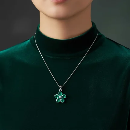 model wearing green onyx silver pendant with cubic zirconia