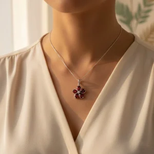 model wearing garnet silver pendant with cubic zirconia