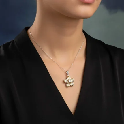 model wearing citrine silver pendant with cubic zirconia