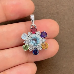 beautifully portraying the multi gemstone silver pendant on hands