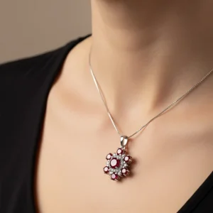 model wearing round flower shaped garnet silver pendant with cubic zirconia